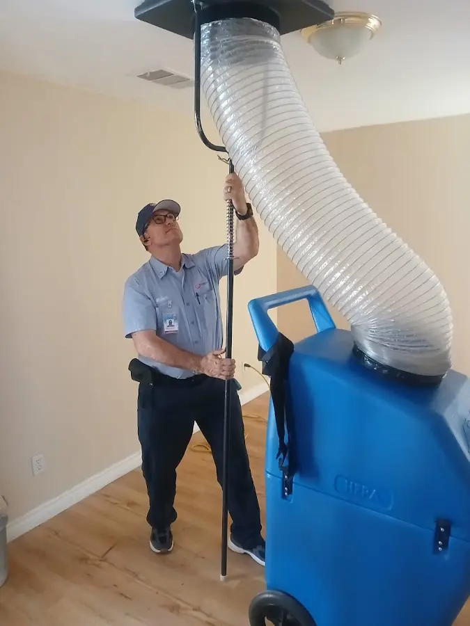 Mini Split Installation technician using HEPA equipment in Eldorado at Santa Fe